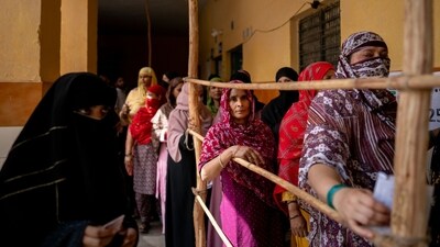 Women in Jharkhand wait to cast their ballot during the 2024 Lok Sabha elections. (Bloomberg Photo) Women in Jharkhand wait to cast their ballot during the 2024 Lok Sabha elections. (Bloomberg Photo)