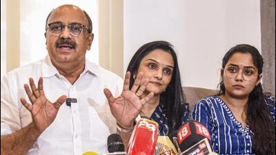 Malayalam actor Siddique with fellow industry stars Jomol and Ananya addresses the media on the Justice Hema Committee report in Kochi on August 23. (PTI Photo)