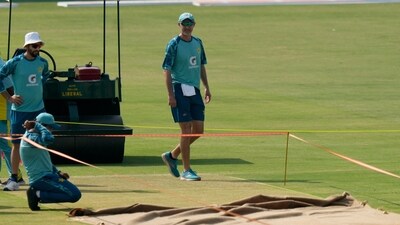 Pakistan's test team's head coach Jason Gillespie, center, examines the pitch (AP) Pakistan's test team's head coach Jason Gillespie, center, examines the pitch (AP)