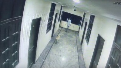 CCTV footage shows Uday stepping out of his room and encountering a dog in the hotel corridor CCTV footage shows Uday stepping out of his room and encountering a dog in the hotel corridor