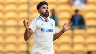 Mohammed Siraj reacts during the fifth day of the first test cricket match between India and New Zealand. (PTI) Mohammed Siraj reacts during the fifth day of the first test cricket match between India and New Zealand. (PTI)