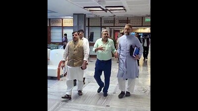 TMC MP Kalyan Banerjee, AIMIM MP Asaduddin Owaisi and AAP MP Sanjay Singh leave after a raucous JPC meeting. (ANI)