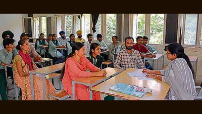 Teachers interact with parents at mega PTM at Meritorious School in Ludhiana on Tuesday. (HT Photo) Teachers interact with parents at mega PTM at Meritorious School in Ludhiana on Tuesday. (HT Photo)
