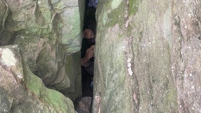 A woman dropped her phone and got stuck upside-down in a rock crevice in Hunter Valley, Australia. (Instagram/@nswambulance) A woman dropped her phone and got stuck upside-down in a rock crevice in Hunter Valley, Australia. (Instagram/@nswambulance)