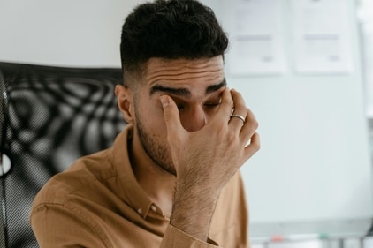 Headache is a common effect of prolonged screentime. (Pexels)