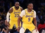 LeBron James and Bronny James of the Los Angeles Lakers on defense during the second quarter against the Minnesota Timberwolves at Crypto.com Arena LeBron James and Bronny James of the Los Angeles Lakers on defense during the second quarter against the Minnesota Timberwolves at Crypto.com Arena