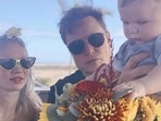 Grimes and Elon with their son.