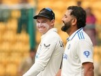 Bengaluru: India's Rohit Sharma and New Zealand's Tom Latham enter the ground for the national anthem. Bengaluru: India's Rohit Sharma and New Zealand's Tom Latham enter the ground for the national anthem.