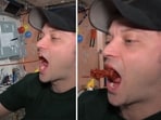 The image shows US astronaut Matthew Dominick drinking ketchup directly from a bottle while on the ISS. 
