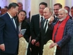 Prime Minister Narendra Modi with Russian President Vladimir Putin and Chinese President Xi Jinping at the dinner hosted for BRICS leaders, in Kazan on Tuesday.
