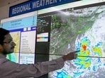 Cyclone Dana: Scientist Sourish Bandopadhyay shows the progress of cyclonic storm 'Dana' on a digital screen, at the regional meteorogical centre in Kolkata, Tuesday, Oct. 22, 2024.