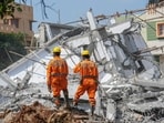 NDRF personnel during a rescue operation after an under-construction building collapsed in Bengaluru. NDRF personnel during a rescue operation after an under-construction building collapsed in Bengaluru.