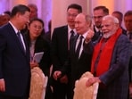 Chinese President Xi Jinping, Russian President Vladimir Putin and Indian Prime Minister Narendra Modi attend a concert before an informal dinner on the sidelines of the BRICS Summit in Kazan, Russia October 22, 2024. 