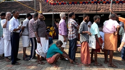 People in Kerala wait to cast their ballot during the 2024 Lok Sabha polls. (AP Photo)