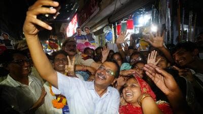 Kejriwal takes a selfie with a Mehrauli resident during his padyatra. (HT) Kejriwal takes a selfie with a Mehrauli resident during his padyatra. (HT)