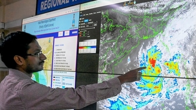 Cyclone Dana: Scientist Sourish Bandopadhyay shows the progress of cyclonic storm 'Dana' on a digital screen, at the regional meteorogical centre in Kolkata, Tuesday, Oct. 22, 2024. (PTI) Cyclone Dana: Scientist Sourish Bandopadhyay shows the progress of cyclonic storm 'Dana' on a digital screen, at the regional meteorogical centre in Kolkata, Tuesday, Oct. 22, 2024. (PTI)