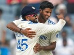 India's Washington Sundar , right, and India's captain Rohit Sharma celebrates the dismissal of New Zealand's Tim Southee during the day one of the second cricket test match between India and New Zealand at the Maharashtra Cricket Association Stadium , in Pune, India, Thursday, Oct. 24, 2024. (AP Photo/Rafiq Maqbool) India's Washington Sundar , right, and India's captain Rohit Sharma celebrates the dismissal of New Zealand's Tim Southee during the day one of the second cricket test match between India and New Zealand at the Maharashtra Cricket Association Stadium , in Pune, India, Thursday, Oct. 24, 2024. (AP Photo/Rafiq Maqbool)