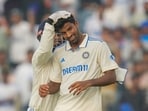 India's Washington Sundar , right, and India's Rishabh Pant react to the dismissal of New Zealand's Mitchell Santner. (AP Photo/Rafiq Maqbool) India's Washington Sundar , right, and India's Rishabh Pant react to the dismissal of New Zealand's Mitchell Santner. (AP Photo/Rafiq Maqbool)