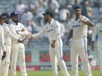 India's Ravichandran Ashwin, second from right, celebrates the dismissal of New Zealand's captain Tom Latham with his team players during the day one of the second cricket test match between India and New Zealand at the Maharashtra Cricket Association Stadium , in Pune, India, Thursday, Oct. 24, 2024. (AP Photo/Rafiq Maqbool) India's Ravichandran Ashwin, second from right, celebrates the dismissal of New Zealand's captain Tom Latham with his team players during the day one of the second cricket test match between India and New Zealand at the Maharashtra Cricket Association Stadium , in Pune, India, Thursday, Oct. 24, 2024. (AP Photo/Rafiq Maqbool)