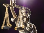 Lady Justice is usually represented as blindfolded and holding a set of scales