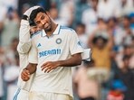 India's Washington Sundar and Rishabh Pant celebrate the wicket of New Zealand's Mitchell Santner. India's Washington Sundar and Rishabh Pant celebrate the wicket of New Zealand's Mitchell Santner.