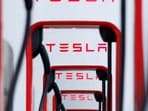Tesla plans to introduce driverless ride-hailing in California and Texas next year, according to CEO Elon Musk. While the company currently offers a limited service to employees, significant regulatory obstacles remain, particularly in California, affecting future approvals.