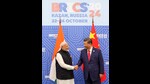 This photograph shared by Ministry of Information and Broadcasting, Government of India, on the X platform shows Chinese President Xi Jinping, right, shaking hands with Indian Prime Minister Narendra Modi, on the sidelines of the BRICS Summit in Kazan, Russia, Wednesday, Oct. 23, 2024. (Ministry of Information and Broadcasting, Government of India, on X via AP) (AP)