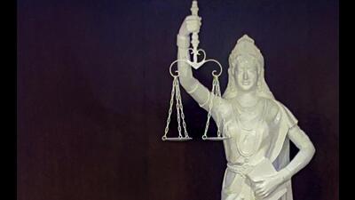 A recent photo of the Lady Justice statue with its blindfold removed and a copy of the Constitution of India placed in her hand at the Supreme Court in New Delhi. (PTI Photo) A recent photo of the Lady Justice statue with its blindfold removed and a copy of the Constitution of India placed in her hand at the Supreme Court in New Delhi. (PTI Photo)