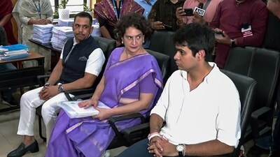 Congress General Secretary Priyanka Gandhi Vadra accompanied by her husband Robert Vadra and son Raihan Vadra during her nomination papers filing for the Wayanad Assembly byelections. (ANI)