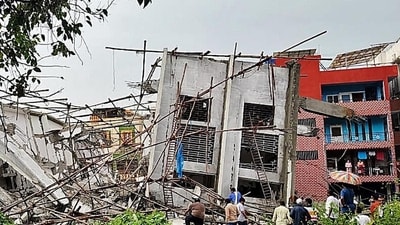 An under-construction building collapsed at Babusapalya amidst the ongoing heavy rainfall, in Bengaluru on Tuesday. (ANI)