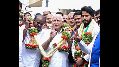 BJP leader BS Yediyurappa, Union Minister HD Kumaraswamy and his son and JDS Karnataka Youth Unit President Nikhil Kumaraswamy being garlanded as NDA fields Nikhil in the Channapatna by-poll, in Bengaluru on Thursday. (ANI) BJP leader BS Yediyurappa, Union Minister HD Kumaraswamy and his son and JDS Karnataka Youth Unit President Nikhil Kumaraswamy being garlanded as NDA fields Nikhil in the Channapatna by-poll, in Bengaluru on Thursday. (ANI)
