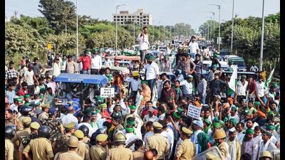 Bharatiya Kisan Union (Tikait) members block the road at Khurdahi Bazar during a protest over the issue of land acquisition by development authorities, in Lucknow on Thursday. (ANI Photo) Bharatiya Kisan Union (Tikait) members block the road at Khurdahi Bazar during a protest over the issue of land acquisition by development authorities, in Lucknow on Thursday. (ANI Photo)