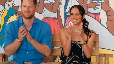 Meghan Markle and Prince Harry during their trip to Africa. (AFP) Meghan Markle and Prince Harry during their trip to Africa. (AFP)
