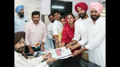 Congress state president and Ludhiana MP Amarinder Singh Raja Warring who retained the Gidderbaha seat for the last three consecutive terms after breaching the Akali bastion accompanied his wife Amrita Warring for filing nomination papers (HT) Congress state president and Ludhiana MP Amarinder Singh Raja Warring who retained the Gidderbaha seat for the last three consecutive terms after breaching the Akali bastion accompanied his wife Amrita Warring for filing nomination papers (HT)