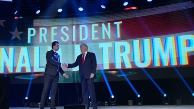 FILE - Former President Donald Trump, right, shakes hands with Turning Point CEO Charlie Kirk before speaking during the Turning Point USA Student Action Summit, Saturday, July 23, 2022, in Tampa, Fla. (AP Photo/Phelan M. Ebenhack, File) (AP) FILE - Former President Donald Trump, right, shakes hands with Turning Point CEO Charlie Kirk before speaking during the Turning Point USA Student Action Summit, Saturday, July 23, 2022, in Tampa, Fla. (AP Photo/Phelan M. Ebenhack, File) (AP)