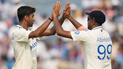 India's Washington Sundar , left, and India's Ravichandran Ashwin celebrates the dismissal of New Zealand's Glenn Philips during the day one of the second cricket test match between India and New Zealand (AP) India's Washington Sundar , left, and India's Ravichandran Ashwin celebrates the dismissal of New Zealand's Glenn Philips during the day one of the second cricket test match between India and New Zealand (AP)