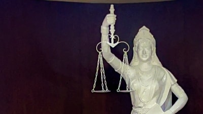 Lady Justice statue with its blindfold removed and a copy of the Constitution of India placed in her hand at the Supreme Court of India. (PTI) Lady Justice statue with its blindfold removed and a copy of the Constitution of India placed in her hand at the Supreme Court of India. (PTI)