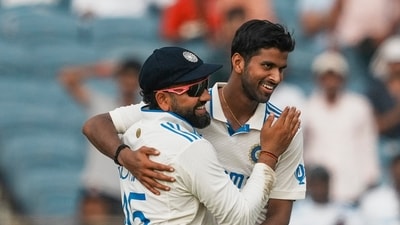 India's Washington Sundar and Rohit Sharma celebrate the wicket of New Zealand's Tim Southee during the first day of the second Test (PTI) India's Washington Sundar and Rohit Sharma celebrate the wicket of New Zealand's Tim Southee during the first day of the second Test (PTI)