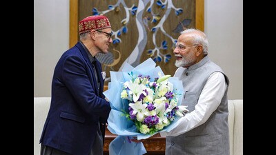 Prime Minister Narendra Modi with Jammu and Kashmir chief minister Omar Abdullah during a meeting in New Delhi. (PTI)