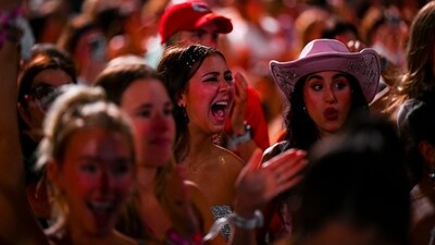 Fans of US singer Taylor Swift cheer during "The Eras Tour" at the Hard Rock stadium in Miami Gardens, Florida, October 18, 2024. (AFP) Fans of US singer Taylor Swift cheer during "The Eras Tour" at the Hard Rock stadium in Miami Gardens, Florida, October 18, 2024. (AFP)
