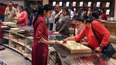 Women in Ahmedabad shop for gold and silver jewellery on the occasion of ‘Pushya Nakshatra’ on Thursday, ahead of the Diwali festival. (File photo) Women in Ahmedabad shop for gold and silver jewellery on the occasion of ‘Pushya Nakshatra’ on Thursday, ahead of the Diwali festival. (File photo)