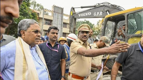 Chief minister Siddaramaiah visits the site where an under-construction building collapsed recently, in Bengaluru on Thursday. (PTI)