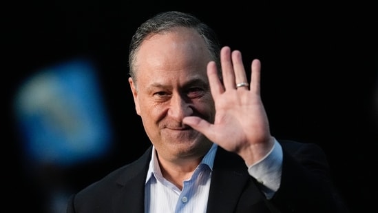 Second gentleman Doug Emhoff waves as he arrives on stage to speak in support of his wife, Democratic presidential nominee Vice President Kamala Harris, at a Get Out the Early Vote rally in Hallandale Beach, Fla., Wednesday, Oct. 23, 2024. (AP Photo/Rebecca Blackwell) (AP)