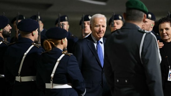 US President Joe Biden is welcomed with military honours upon arrival at Berlin-Brandenburg Airport (BER) in Schoenefeld, southeast of the German capital, late on October 17, 2024. US President Joe Biden began a farewell visit to Germany on October 17 for talks with European leaders on support for Ukraine in its war against Russia and on the Middle East conflict. (AFP)