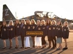 Russian pilots' wives were tricked into posing for a fake calendar shoot. Russian pilots' wives were tricked into posing for a fake calendar shoot.