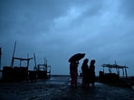 At least 1.1 million people on India's eastern coast are fleeing to storm shelters inland, hours before a powerful cyclone is expected to hammer the low-lying region, ministers said on October 24. (Photo by DIBYANGSHU SARKAR / AFP)