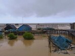 View of a jetty ahead of cyclone Dana landfall at Dhamra in Bhadrak district.