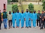 7 criminals of Lawrence and Anmol Bishnoi gang after their arrest by the Special Cell of the Delhi Police from various places, in New Delhi, Friday.