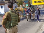 Security personnel keep vigil on the Gulmarg-Botapathri road during a search operation following a terror attack on an army vehicle, in Gulmarg, Jammu and Kashmir, on Friday. (PTI) Security personnel keep vigil on the Gulmarg-Botapathri road during a search operation following a terror attack on an army vehicle, in Gulmarg, Jammu and Kashmir, on Friday. (PTI)