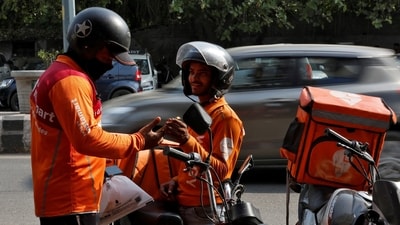 Gig workers prepare to deliver orders outside Swiggy's grocery warehouse at a market area in New Delhi, India, May 6, 2024. (Priyanshu Singh/Reuters) Gig workers prepare to deliver orders outside Swiggy's grocery warehouse at a market area in New Delhi, India, May 6, 2024. (Priyanshu Singh/Reuters)